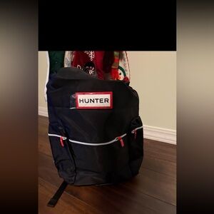 Hunter Black Topclip Backpack with Red Details